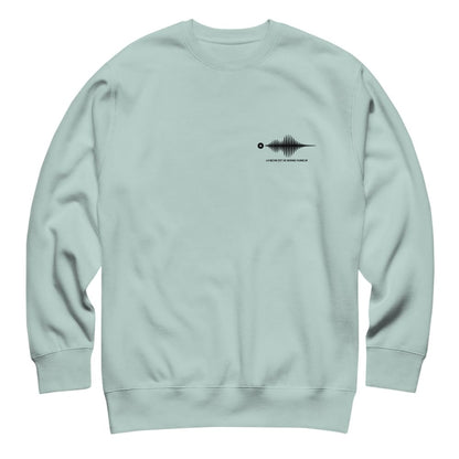 Light blue sweatshirt with a black graphic on the chest against a white background
