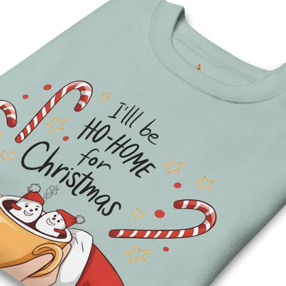 Light blue t-shirt with Christmas-themed design featuring snowmen and candy canes.