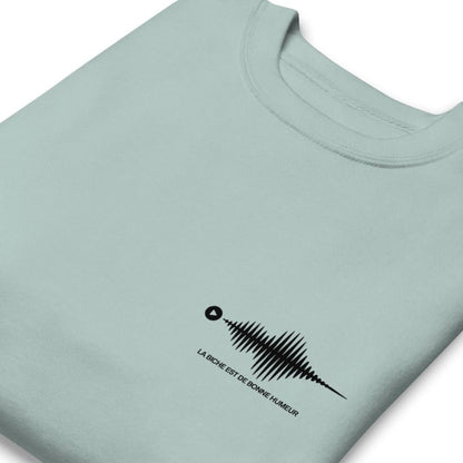 Light blue t-shirt with a black graphic design on a white background