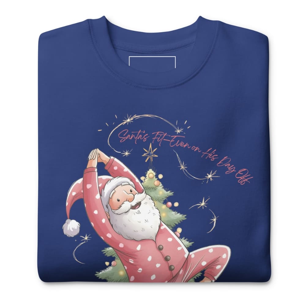 Blue sweatshirt with a cartoon Santa Claus doing yoga pose and Christmas tree design on a white background.