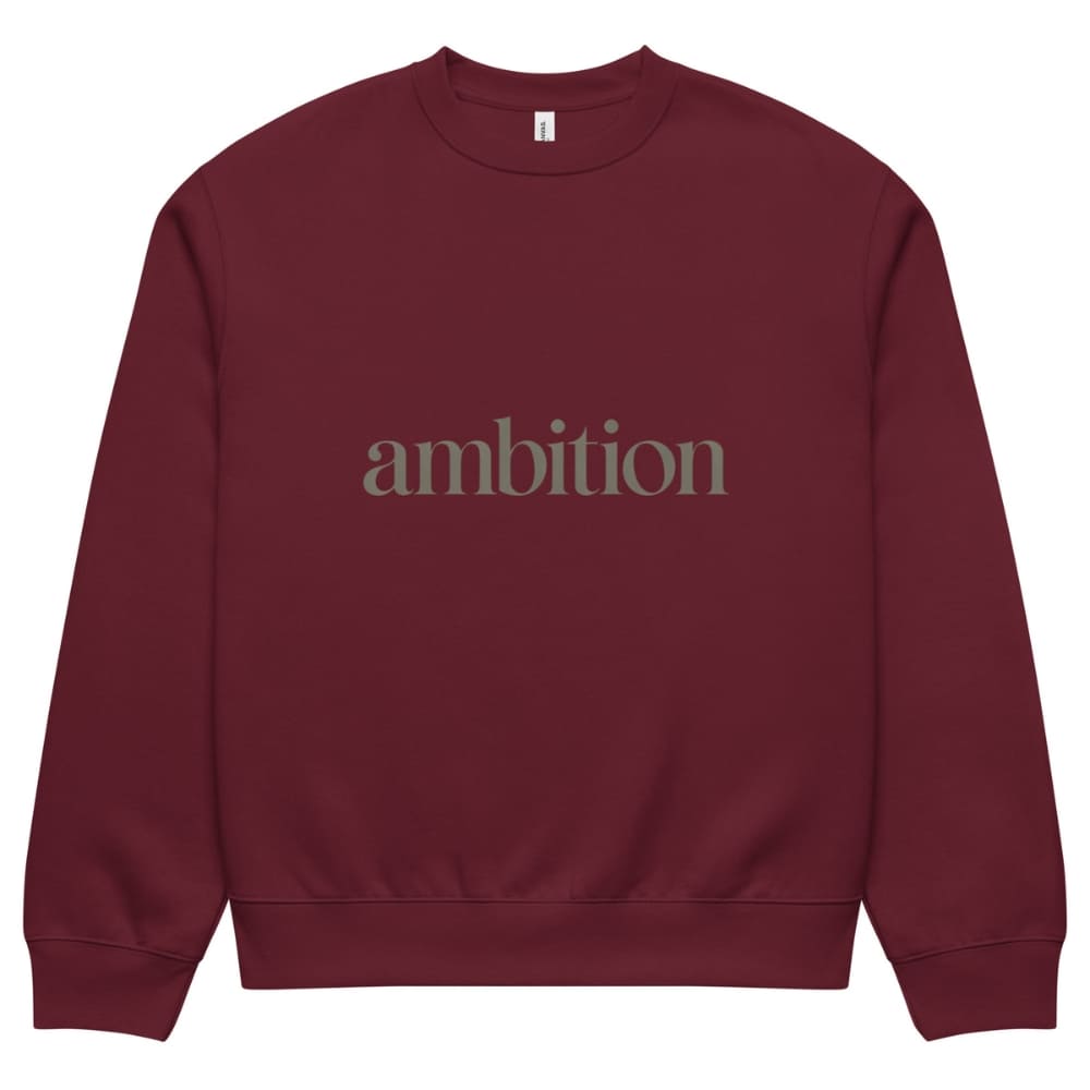 Maroon sweatshirt with 'ambition' text on a white background