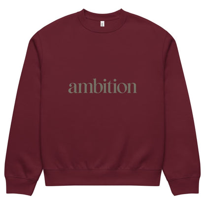 Maroon sweatshirt with 'ambition' text on a white background