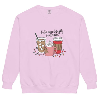 Pink sweatshirt with coffee-themed design and text on a white background
