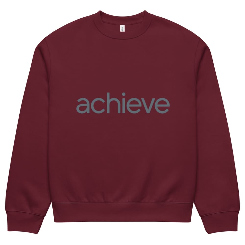 Maroon sweatshirt with 'achieve' text on a white background