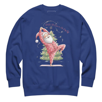 Blue sweatshirt with a Christmas-themed design of Santa Claus doing yoga.