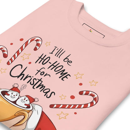 Pink t-shirt with Christmas-themed design and text on a white background