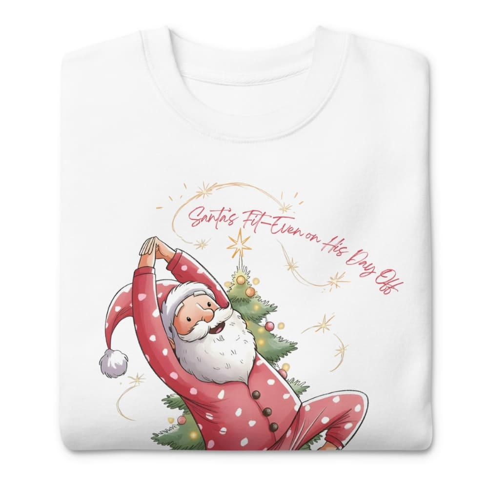 White sweatshirt with a cartoon Santa Claus doing yoga and Christmas tree, text 'Santa's Fit Even on His Day Off'.