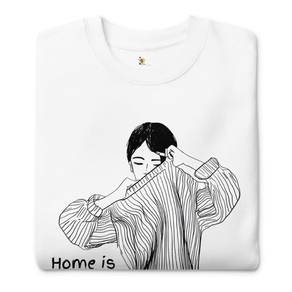 White sweatshirt with black and white illustration of a person wearing a striped shirt and 'Home is' text.
