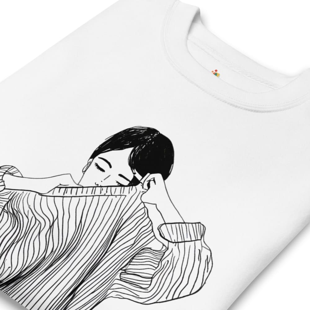 White t-shirt with black line art of a person wearing a dress on a white background