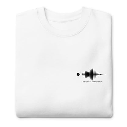 White t-shirt with a black sound wave design and text on a white background