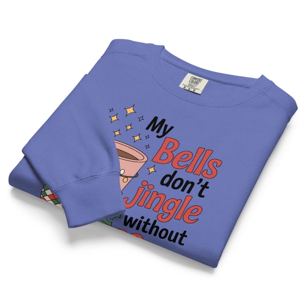 Folded blue sweatshirt with humorous text design on a white background