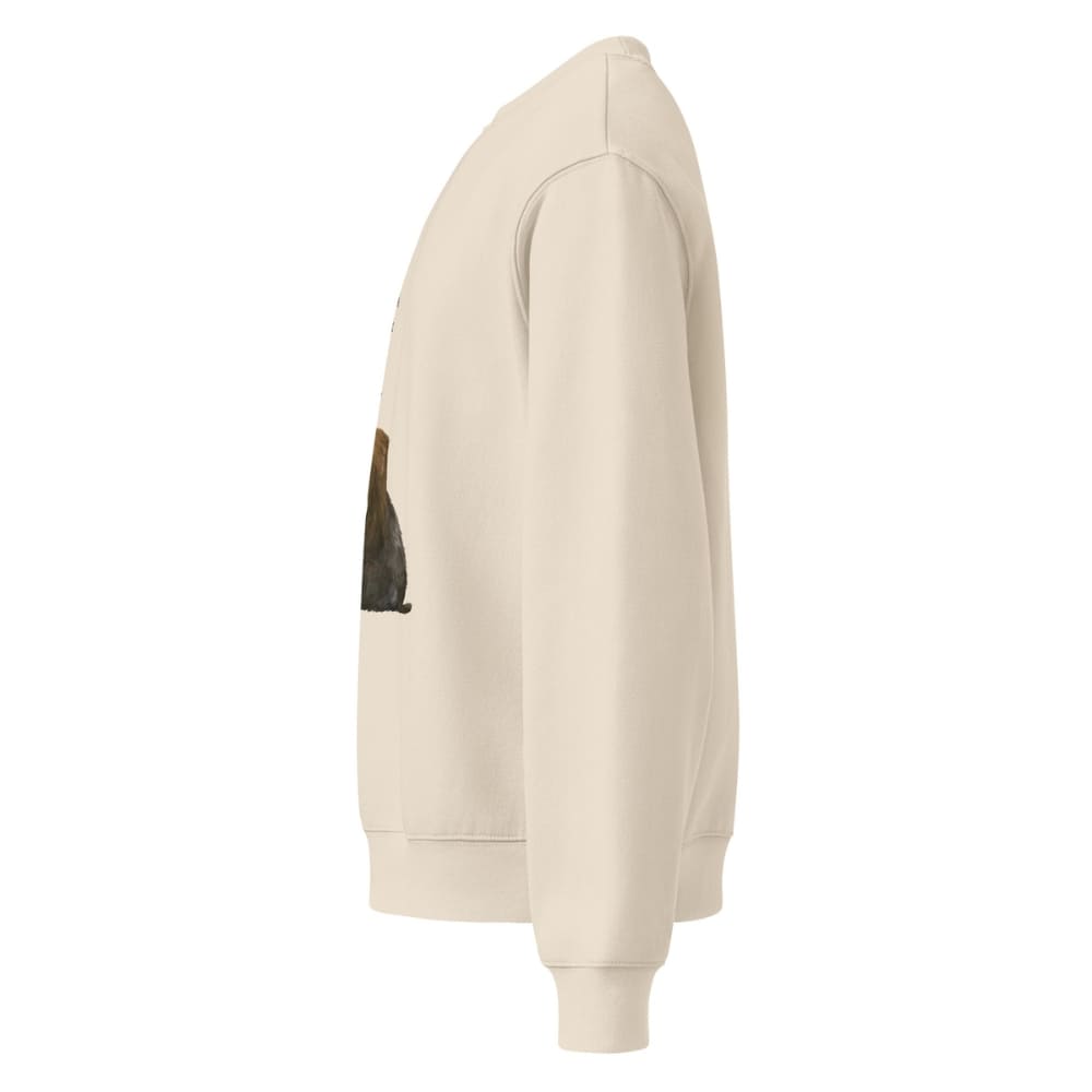 Beige hoodie with a black patch on a white background