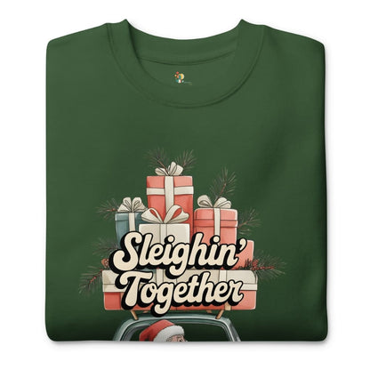 Green t-shirt with Christmas-themed design featuring presents and 'Sleighin' Together' text on a white background.