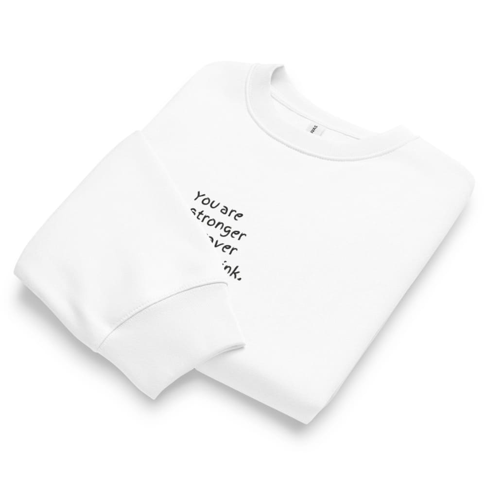 White t-shirt with motivational quote on a white background