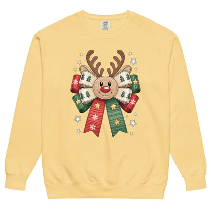 Yellow sweatshirt with a reindeer and bow design on a white background