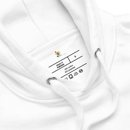 Close-up of a white garment with a label on a white background