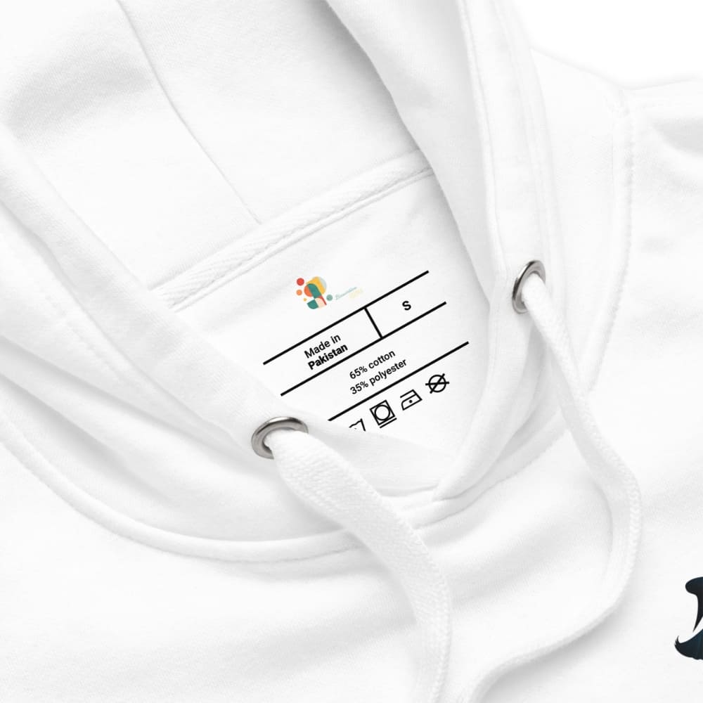 Close-up of a white garment with a label on a white background