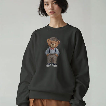 Person wearing a black sweatshirt with a teddy bear graphic on a plain background