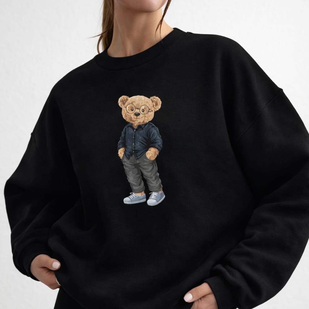 Black sweatshirt with a teddy bear design on a plain background