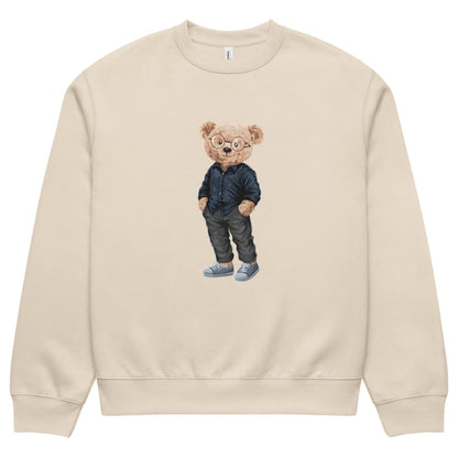 Beige sweatshirt with a teddy bear wearing glasses and a denim jacket on a white background