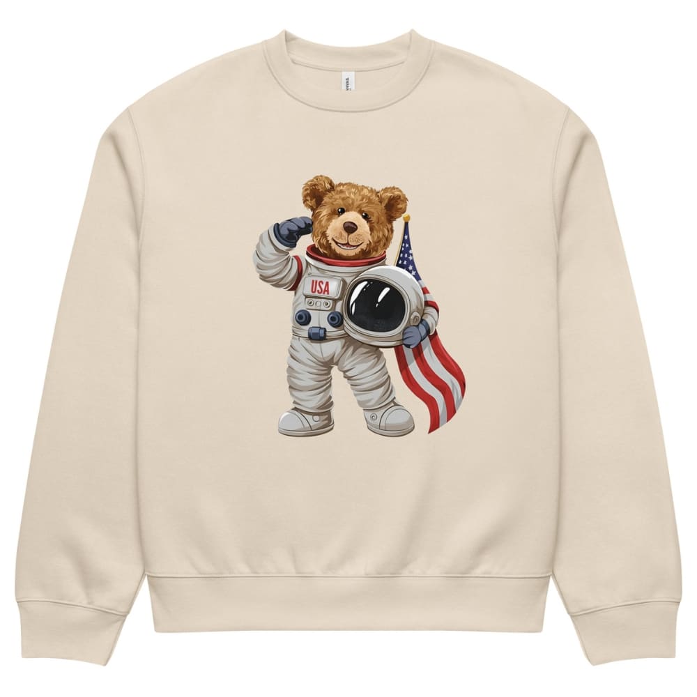Beige sweatshirt with a teddy bear astronaut graphic on a white background