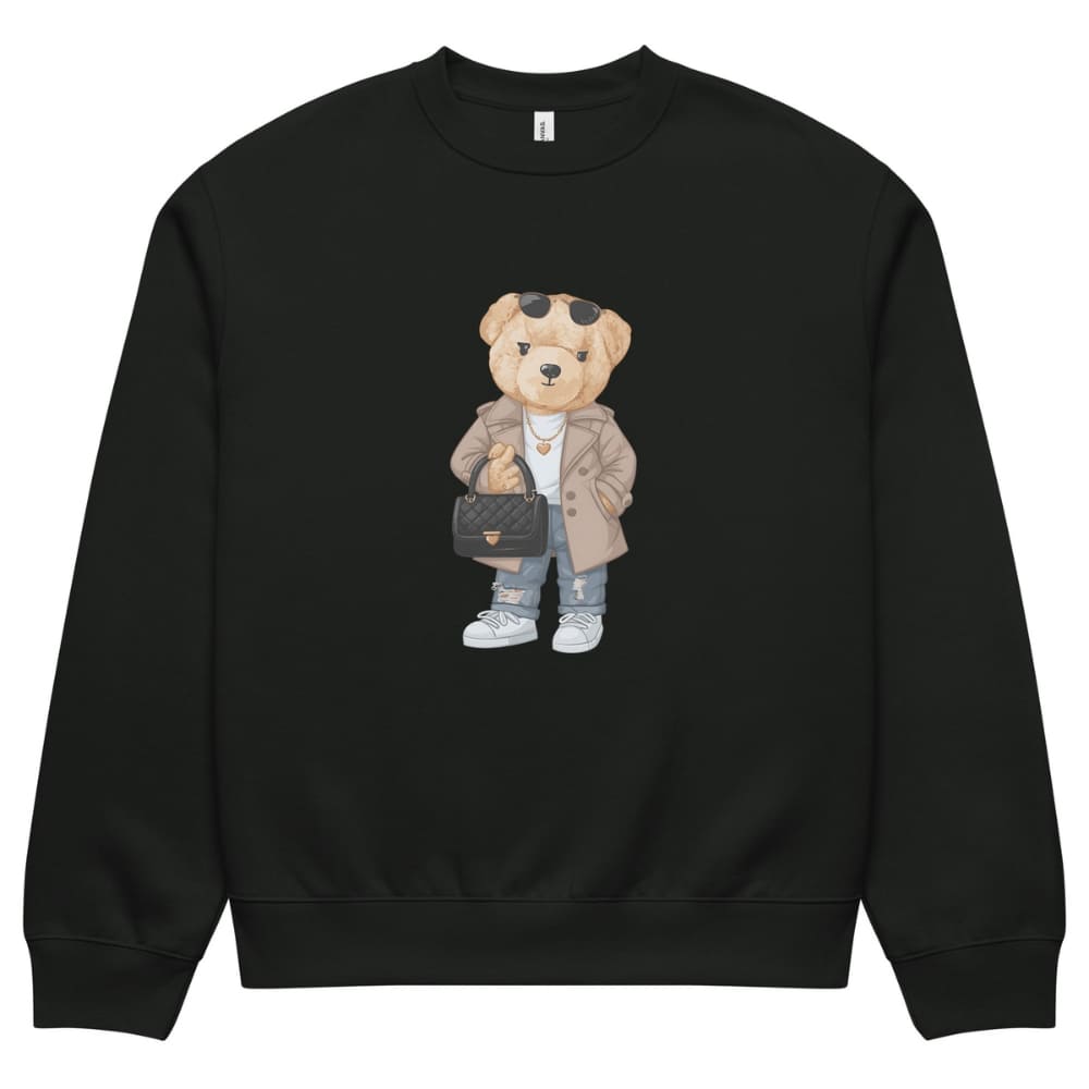 Black sweatshirt with a teddy bear design holding a handbag on a white background