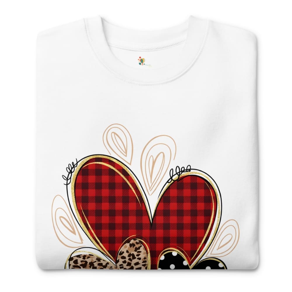 White sweatshirt with a red plaid heart design on a white background