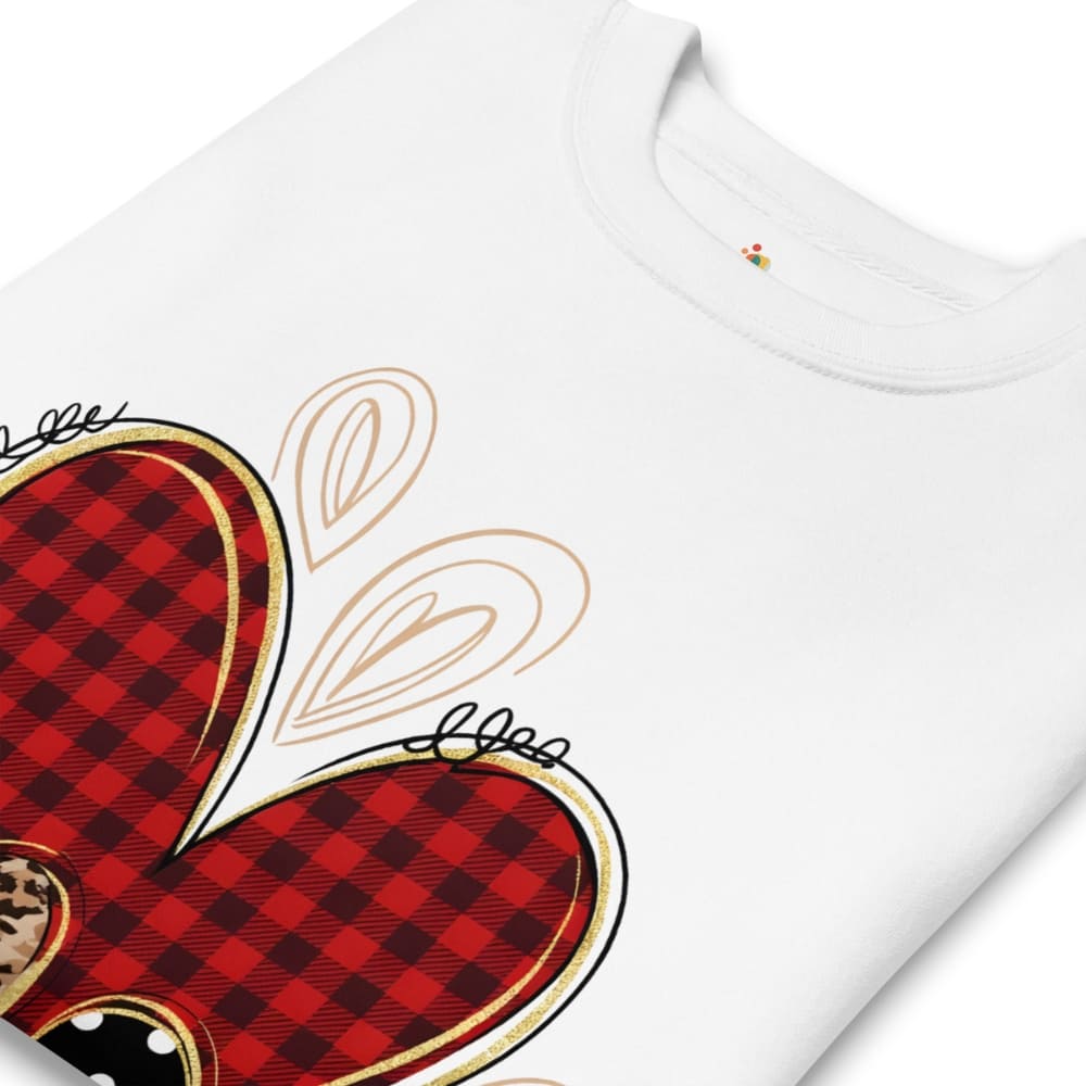 White t-shirt with a red and black checkered heart design on a white background