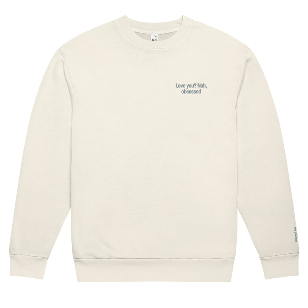 Beige sweatshirt with text on a white background