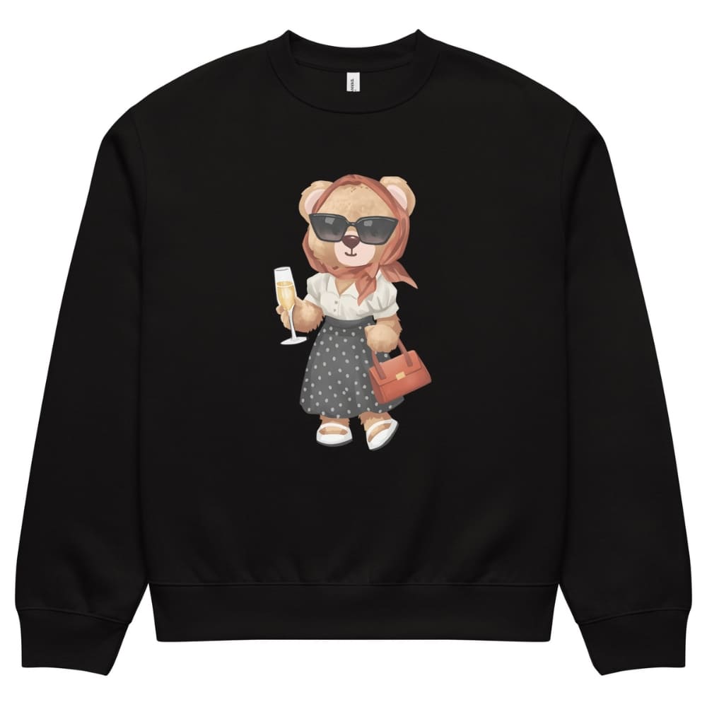 Black sweatshirt with a teddy bear design holding a glass and handbag on a white background