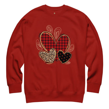 Red sweatshirt with decorative hearts design on a white background