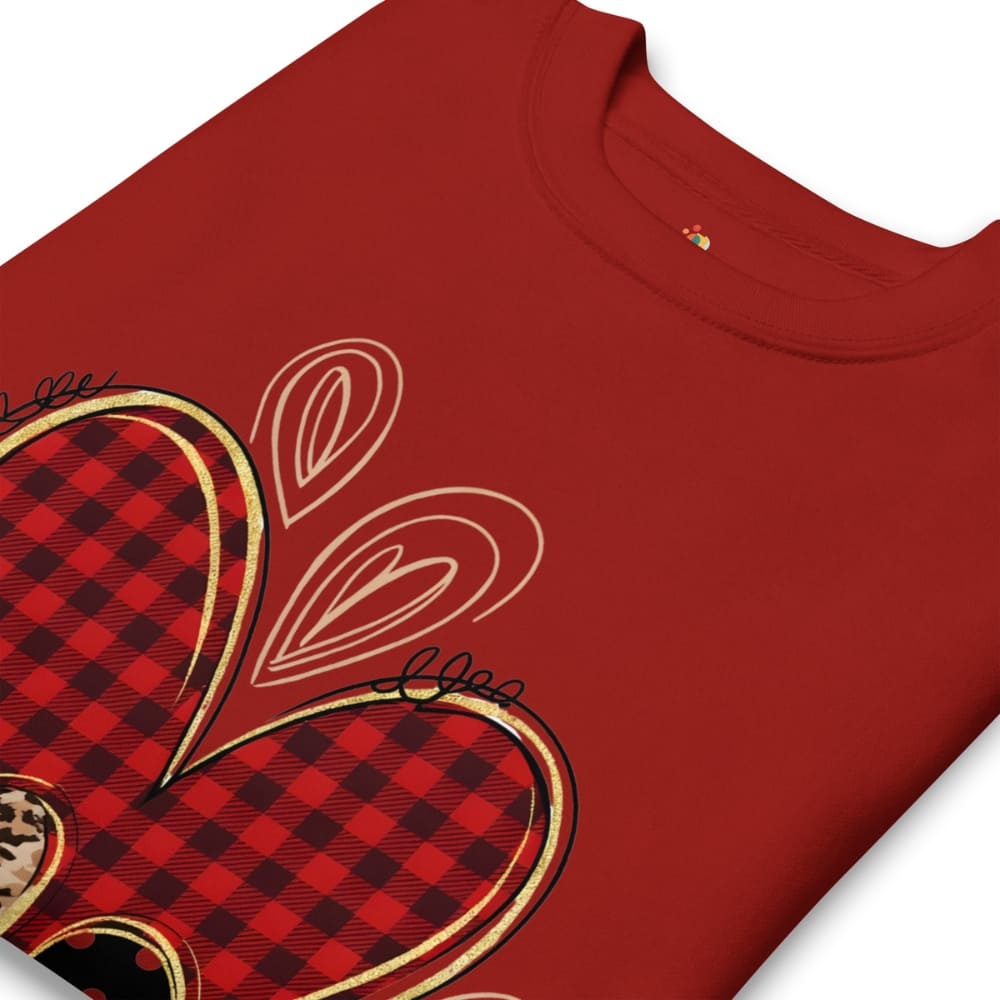 Red t-shirt with plaid heart design on a white background