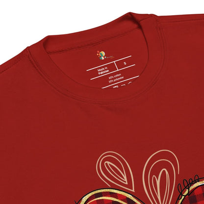 Red t-shirt with a brand label on the collar and plaid pattern at the bottom.