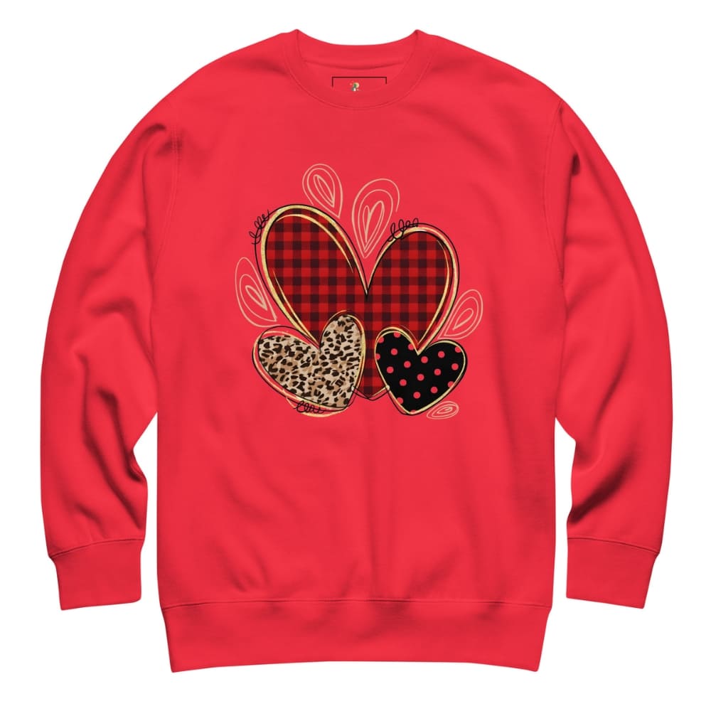 Red sweatshirt with heart designs on a white background