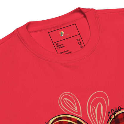 Red t-shirt with a brand label and design details on a white background