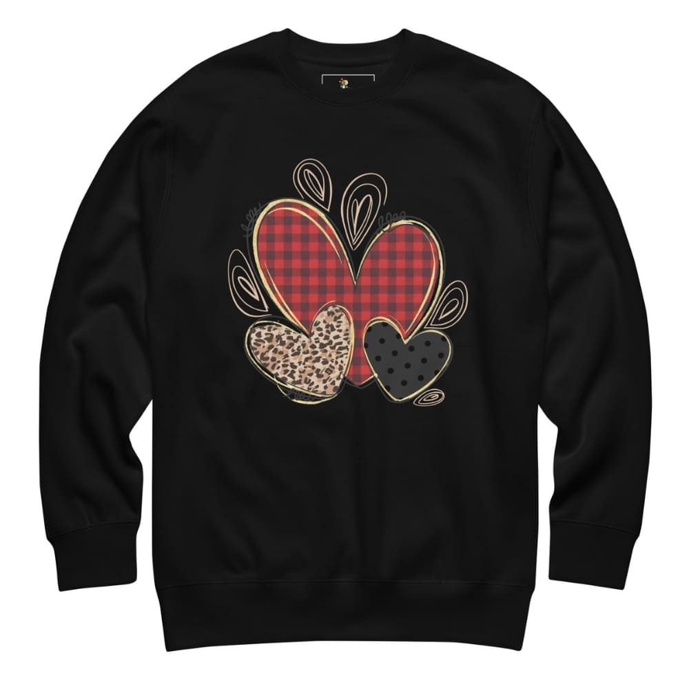 Black sweatshirt with heart designs on a white background