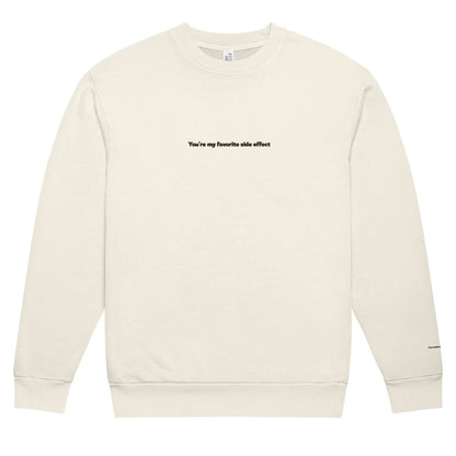 Beige sweatshirt with text on a white background