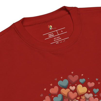 Red t-shirt with colorful heart designs on a white background