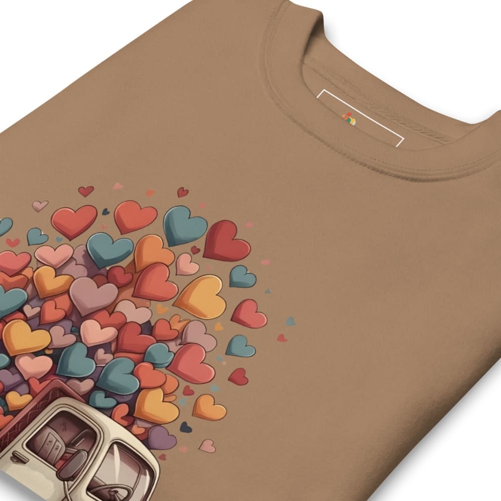 Brown t-shirt with colorful heart design and can opener on a white background