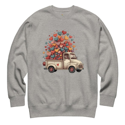 Gray sweatshirt with a truck and heart design on a white background