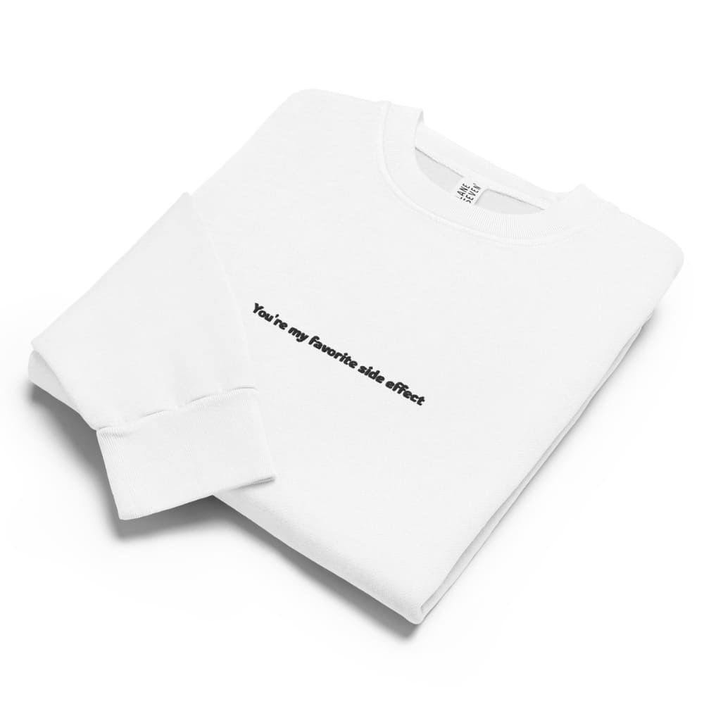 White t-shirt with text on a white background