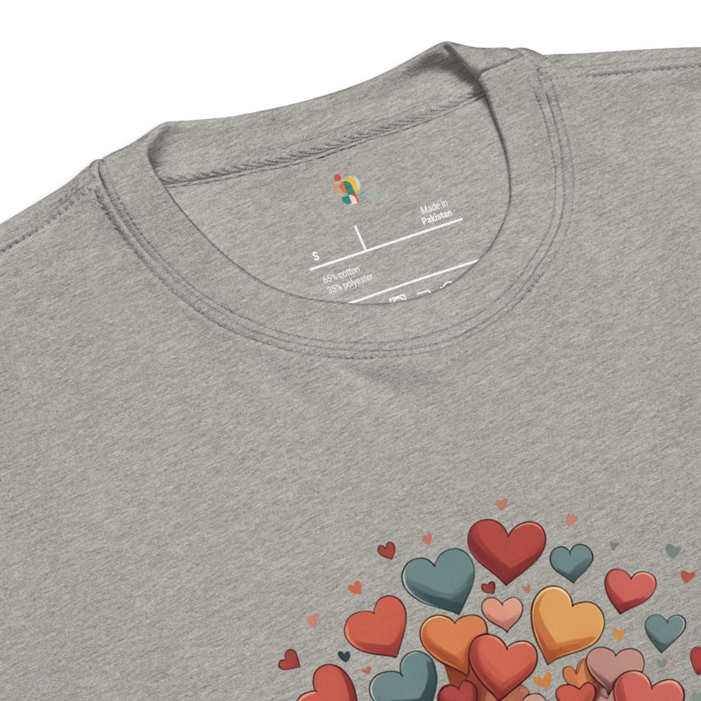 Gray t-shirt with colorful heart designs on a white background
