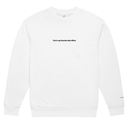 White sweatshirt with black text on a white background