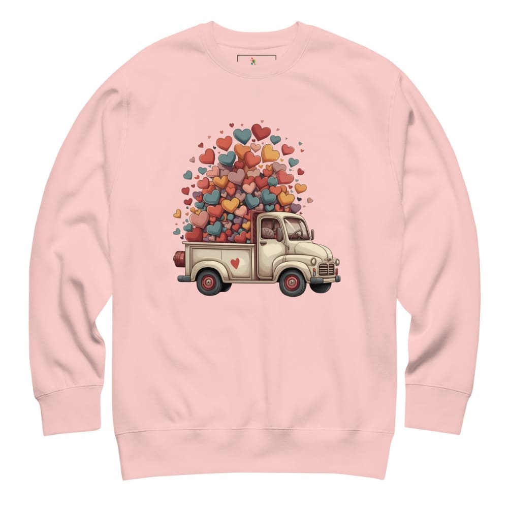 Pink sweatshirt with a truck and heart design on a white background