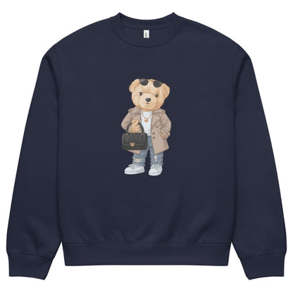 Navy blue sweatshirt with a teddy bear graphic holding a handbag on a white background
