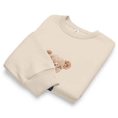 Beige sweatshirt with a teddy bear design on a white background