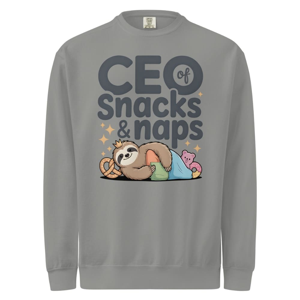 "CEO of Snacks & Naps" printed sweatshirt featuring a sloth in a crown surrounded by pretzels and plushies on vintage-washed cotton fleece