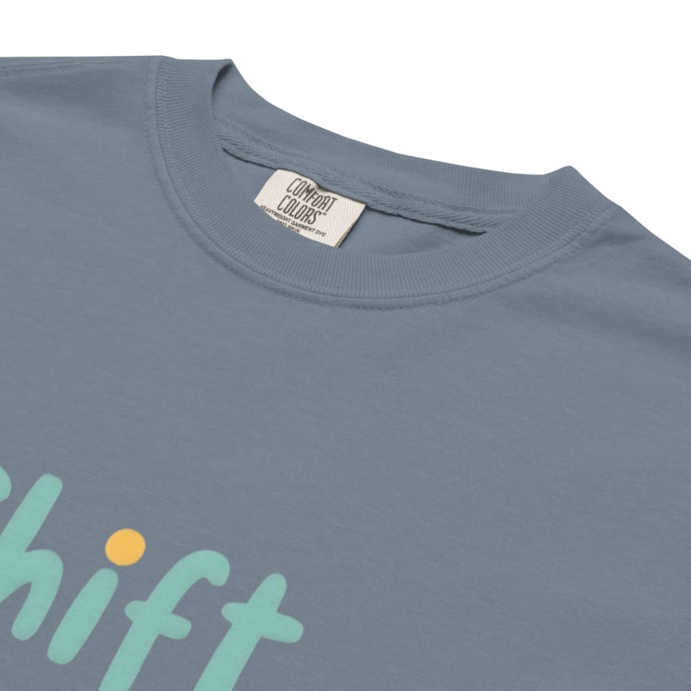 “Shift Happens – Nurse Edition” pastel text design printed on a thick garment-dyed cotton t-shirt, perfect for nurses and healthcare professionals with a sense of humor.