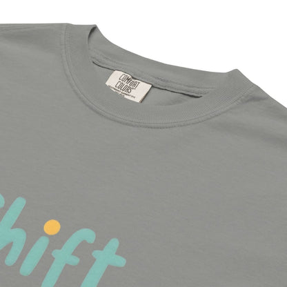 “Shift Happens – Nurse Edition” pastel text design printed on a thick garment-dyed cotton t-shirt, perfect for nurses and healthcare professionals with a sense of humor.