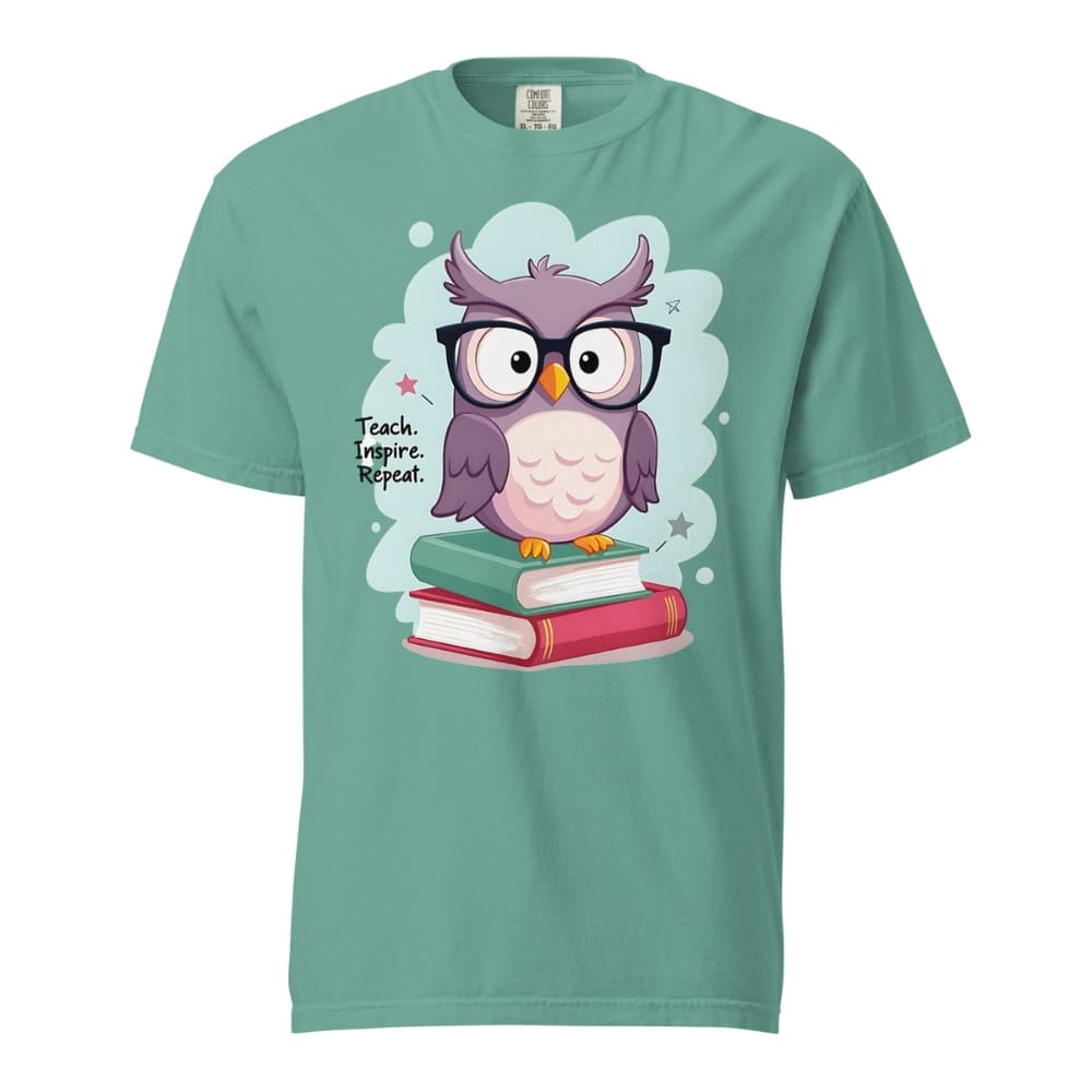 Cute purple owl with glasses sitting on stacked books, with quote "Teach. Inspire. Repeat." – printed on a teacher t-shirt